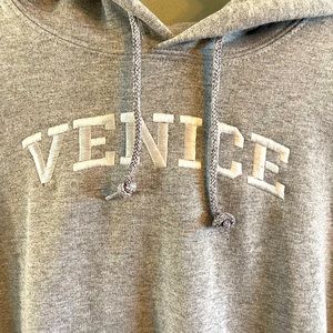 Sweatshirt nice and cozy with hood.Brand new without tag.